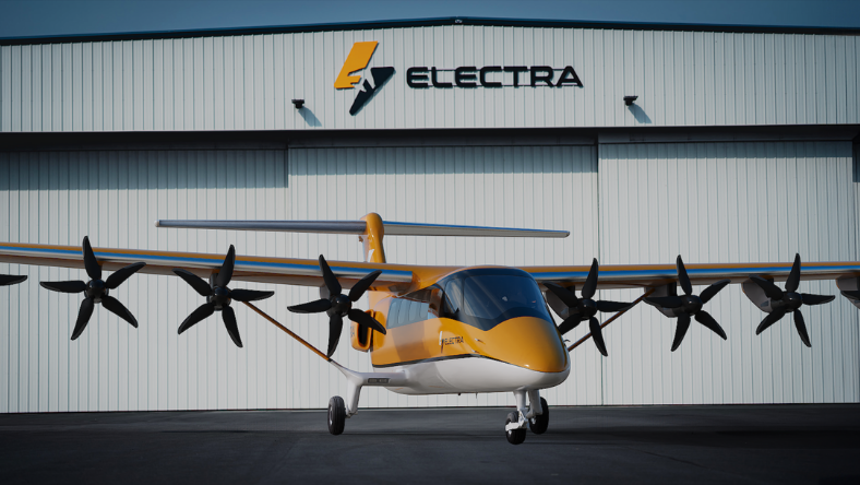Hybrid electric aircraft parked outside an Electra hangar