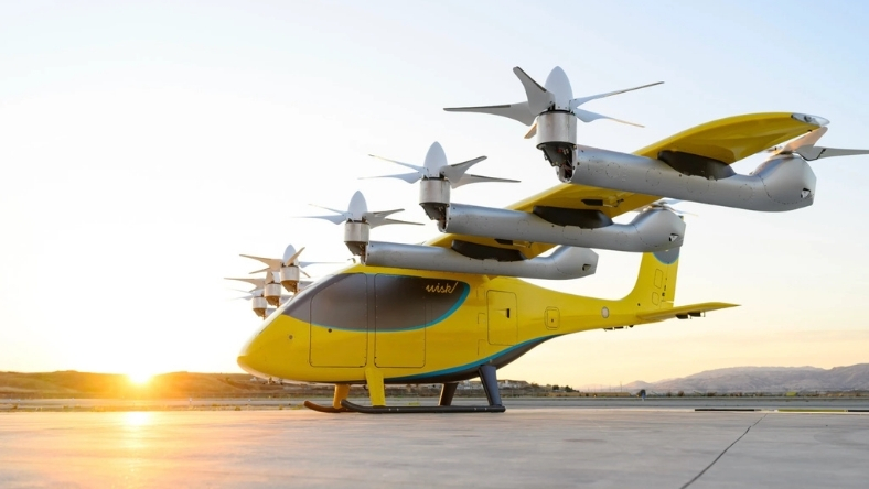 Electric eVTOL aircraft with multiple rotors on airport tarmac at sunset